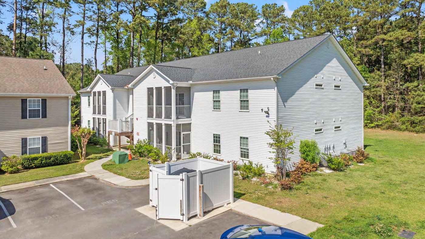 Side exterior and landscaped grounds